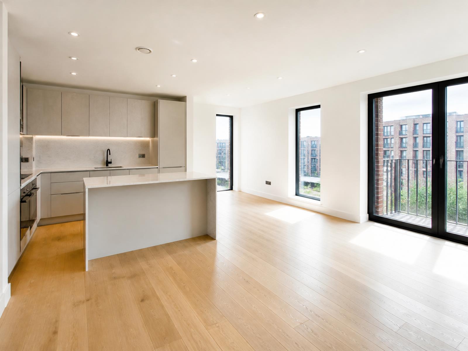 A freshly cleaned, empty living room ready for a new tenant